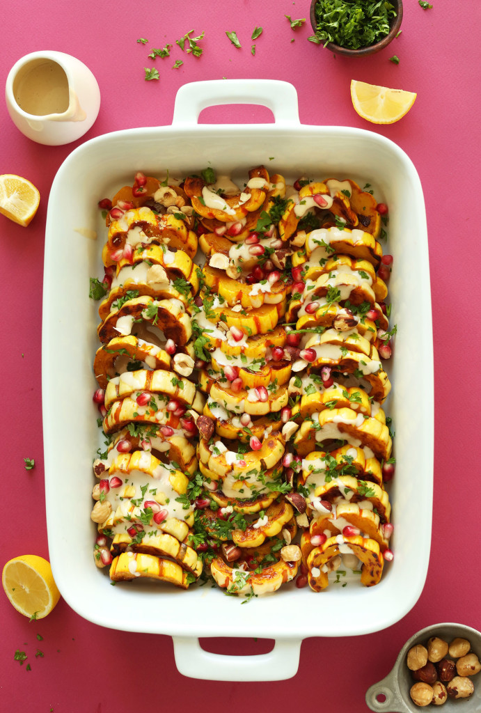 Delicata Squash Bake with Hazelnuts Pomegranates and Tahini Sauce