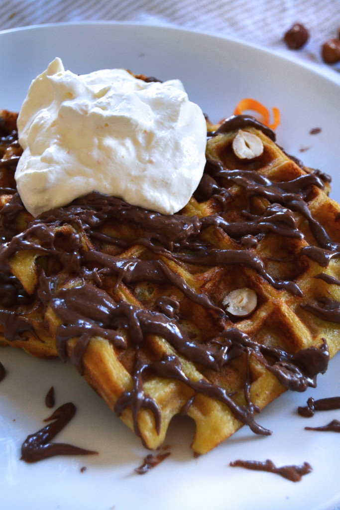 yeasted orange waffles covered in homemade nutella