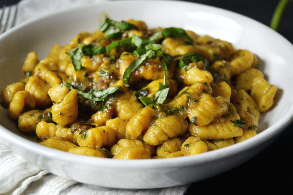 Caramelized-Onion-Sauce-on-Squash-Gnocchi-Close-Up