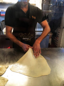 Flipping Roti Dough