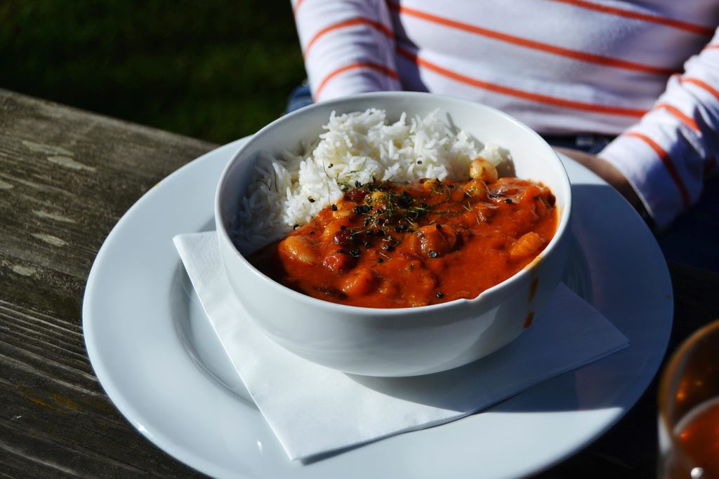 Gluten Free curry with rice outside at Isis Farmhouse