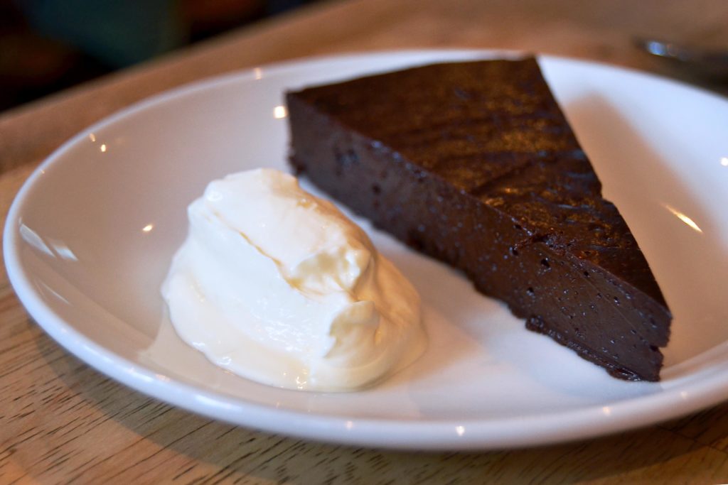 Flourless Chocolate Cake with Cream at Popolo Restaurant